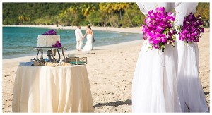 a wedding cake during a wedding reception on magens bay in st thomas